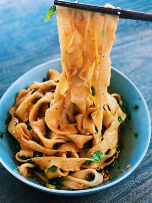  Hand-Pulled Noodles With Spicy Peanut Sauce: Does This Yangquan Delight Offer a Tangy and Textural Tango?